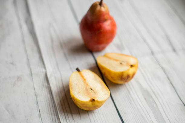 istock Fruit background. Fresh organic pears on old wood. Pear autumn harvest 1179965752