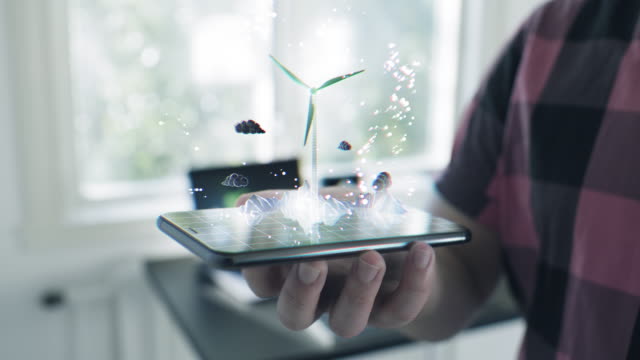 Futuristic Wind Turbine hologram on a smart phone