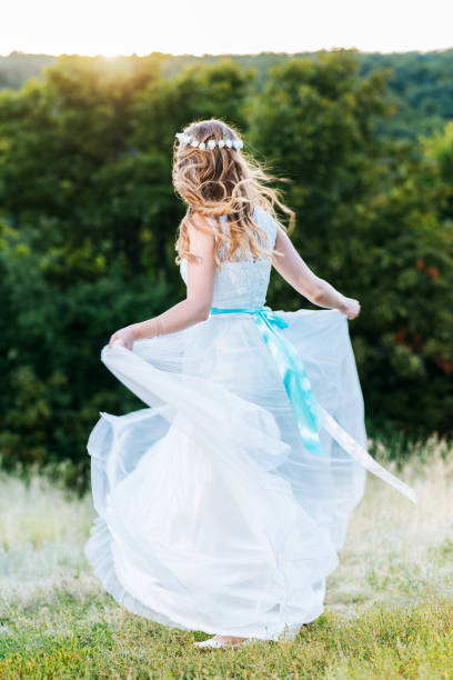istock bride posing for the photographer on the nature 1179968670