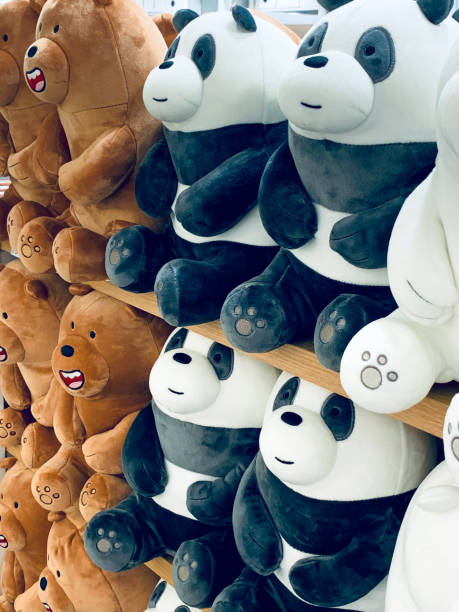 istock Toys, teddy bears and panda sitting on shelves 1179969401