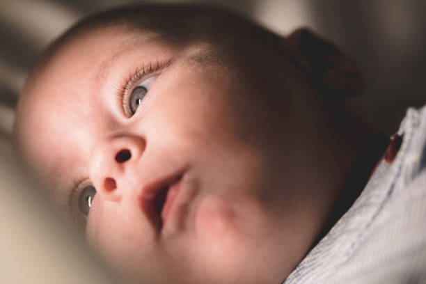 istock Cute baby boy with blue eyes 1179969542