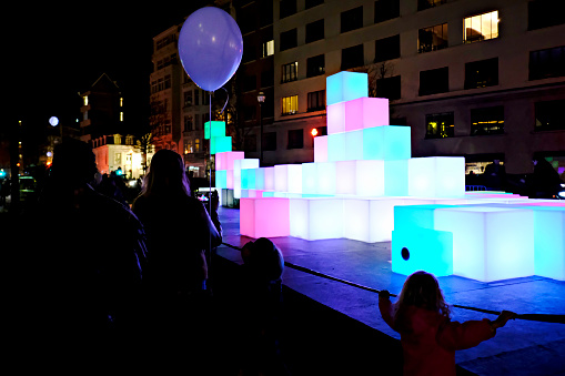 Brussels, Belgium. 15th Feb. 2019. Visitors view an artistic light installation on the Bright Brussels Festival. Bright Brussels is a light festival, a fascinating route through the city.
