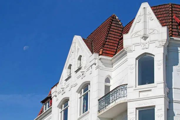 attic of art nouveau building in Hamburg with red roof tiles