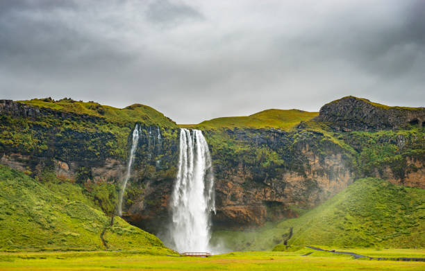 istock Seljalandsfoss Waterfall in Iceland on a cloudy and stormy day. 1179977414
