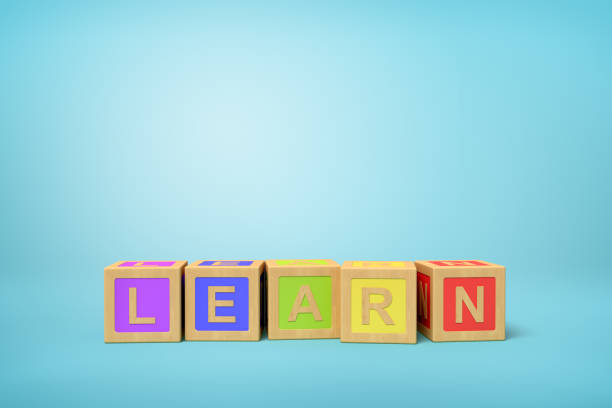 istock 3d rendering of alphabet toy blocks on blue background. 1179978842