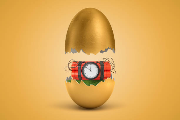 istock 3d rendering of gold egg cracked in two, upper half levitating in air, red dynamite bundle with time bomb on green grass inside lower half. 1179982358