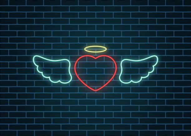 istock Color illustration of a neon heart with wings and a ring on a brick background 1179987423