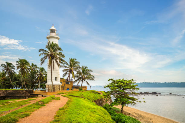 scenery of galle lighthouse Galle Lighthouse and coast in Galle, Sri Lanka southern sri lanka stock pictures, royalty-free photos & images