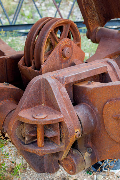 istock Old rusty gears or mechanical parts, crane mechanism 1179989831