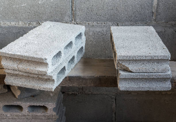istock Cement block on the wooden scaffolding. 1179990014