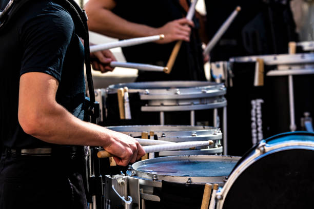 portion of a marching band drum line performing section of a marching band drum line performing drum line stock pictures, royalty-free photos & images