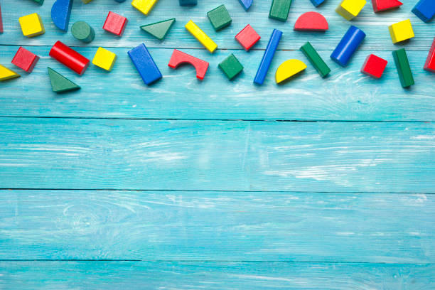 istock Kids educational developing toys frame on white background. Top view. Flat lay. Copy space for text 1179991725