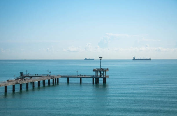 sea pier on sea background with ships for your design