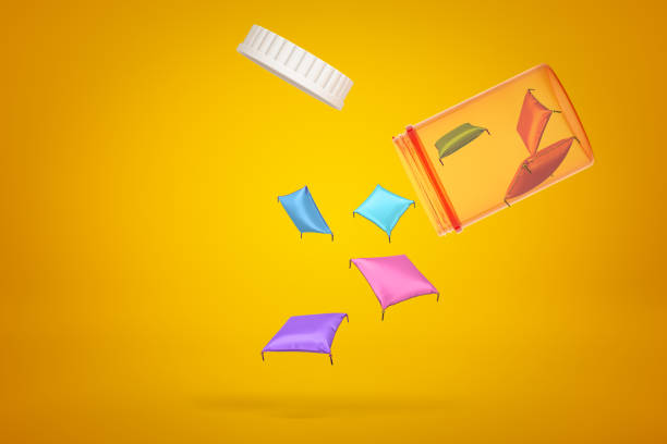 istock 3d rendering of colorful cushions falling from a plastic jar on yellow background 1179992657