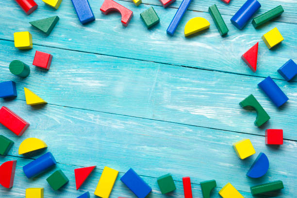 istock Kids educational developing toys frame on white background. Top view. Flat lay. Copy space for text 1179993986