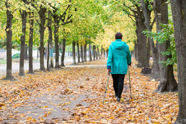 istock A woman is training in Nordic walking. 1179994207
