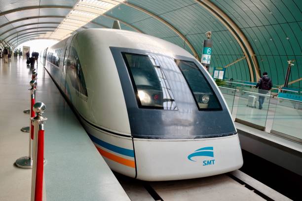 The first Maglev Train in Shanghai and China Shanghai/China-Dec.2016: locomotive of Maglev Train from Longyang Road Station to Shanghai Pudong International Airport. The first Maglev Train in Shanghai and China. Completed in 2006 maglev train stock pictures, royalty-free photos & images