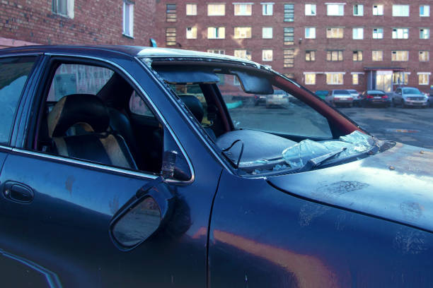 istock Abandoned broken car is on the street 1179994987