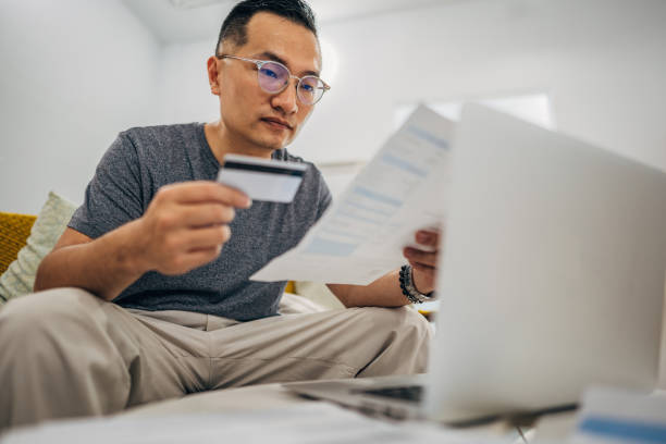 istock Mature man paying bills online 1179995873