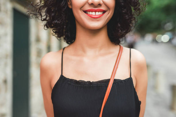 A smile speaks a thousand words Cropped shot of a beautiful young woman smiling while standing outdoors gap toothed stock pictures, royalty-free photos & images