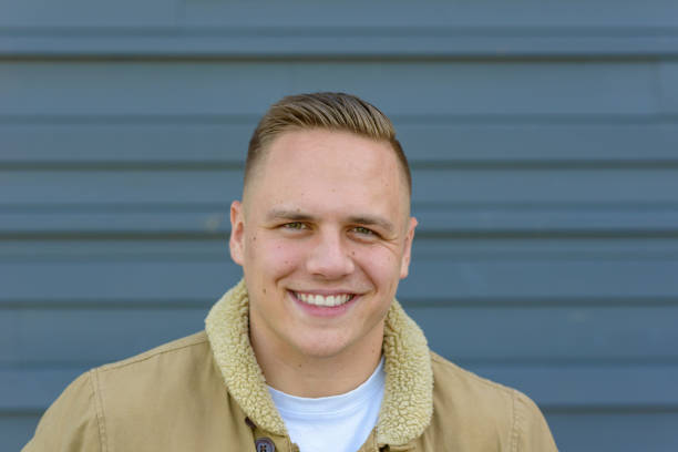 istock Young man with a lovely wide warm smile 1179997855
