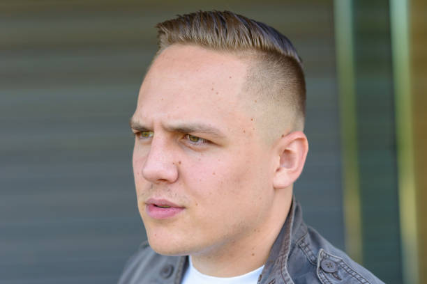 istock Young man frowning in consternation 1179997906