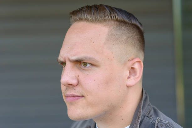 istock Young man frowning in consternation 1179998978