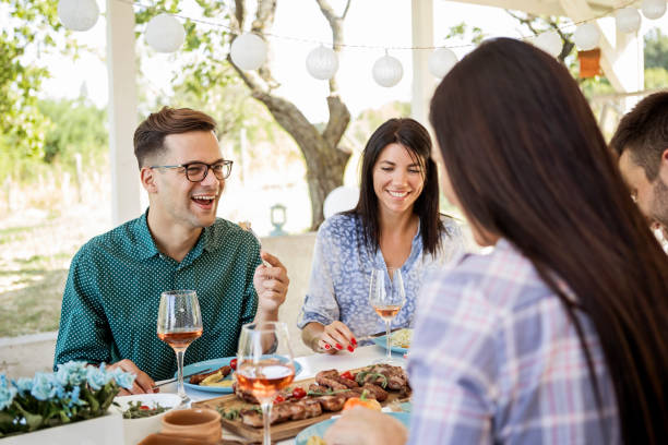 istock Dinner with friends in nature 1180000470