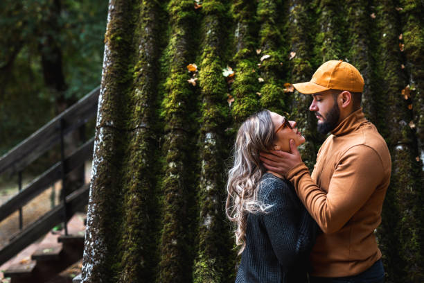 Hipster couple looking each other