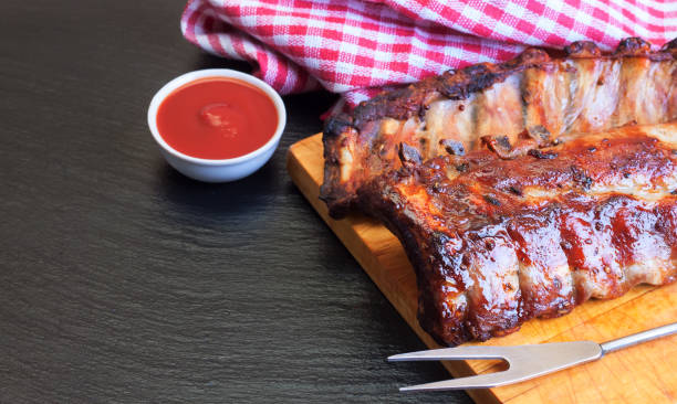 istock grilled pork ribs on a cutting board 1180002082