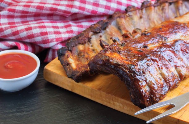 istock grilled pork ribs on a cutting board 1180002207