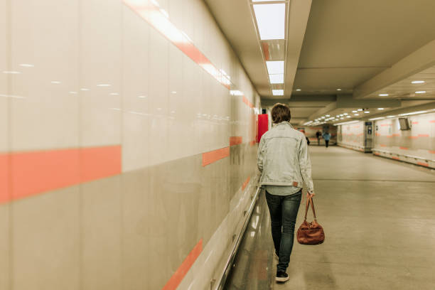 istock Traveler leaving city 1180005146