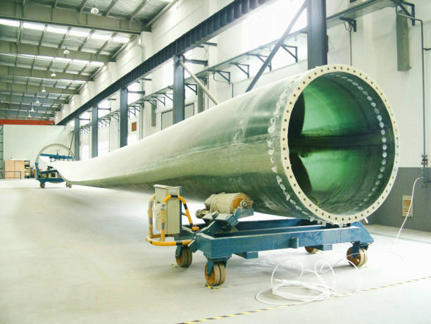 istock Wind turbine blades production line 1180006161