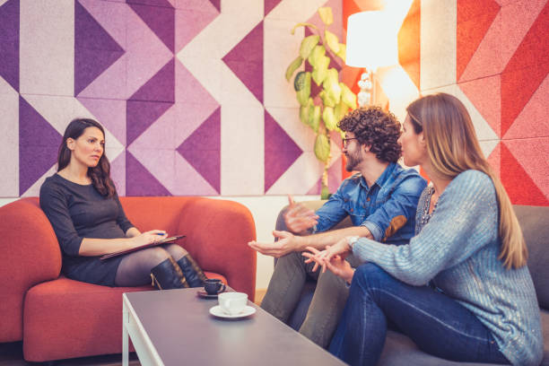 istock Couple on meeting with counsellor 1180006397