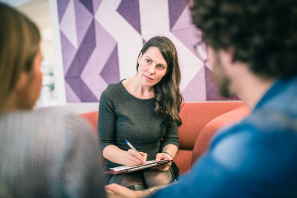 istock Couple on meeting with counsellor 1180006413