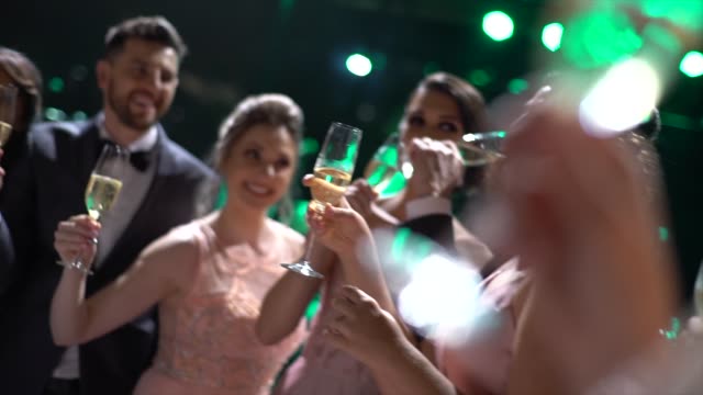 Wedding guests doing a toast