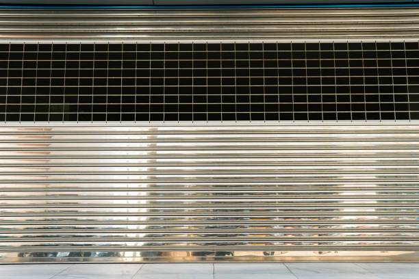 istock Closeup rolling steel door 1180010014