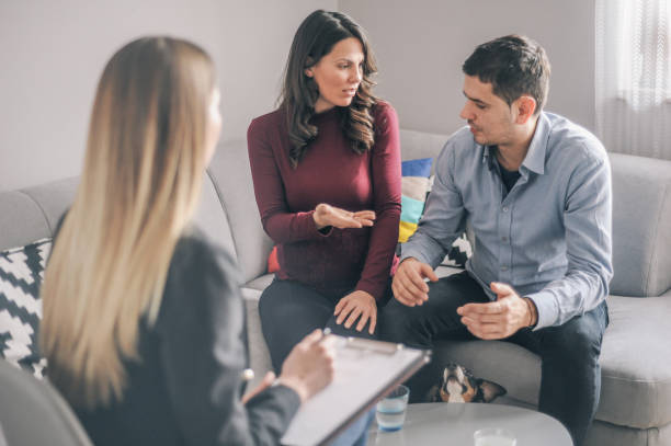 istock Expecting couple on home counselling meeting 1180010647