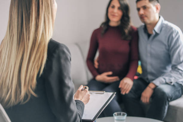istock Expecting couple on home counselling meeting 1180010682