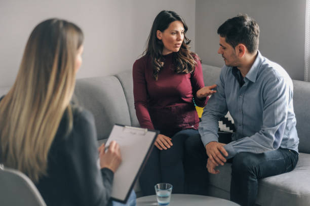 istock Expecting couple on home counselling meeting 1180010701