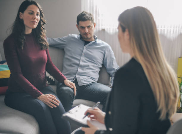 istock Expecting couple on home counselling meeting 1180010702
