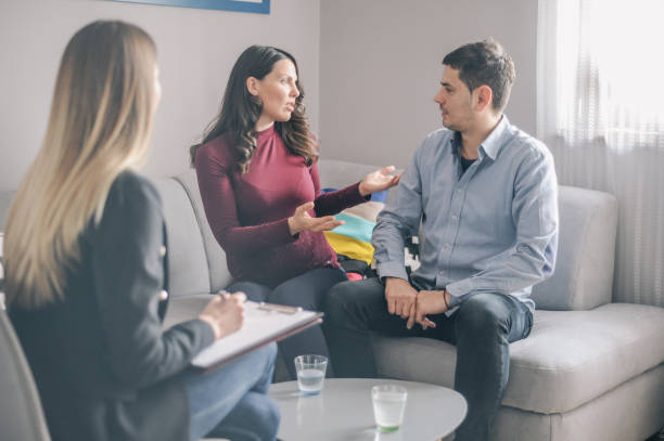 istock Expecting couple on home counselling meeting 1180010715