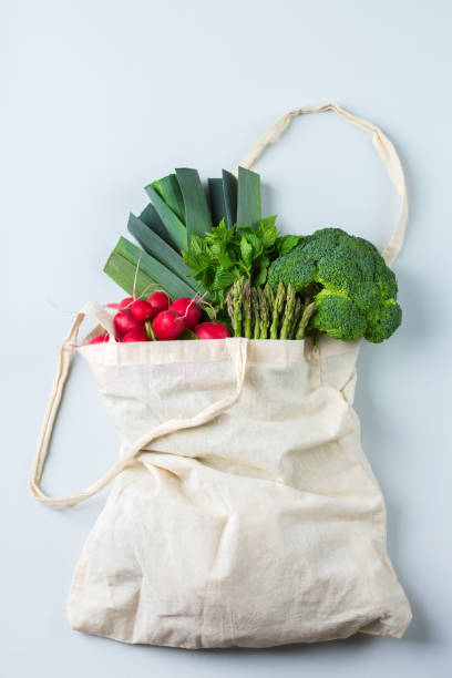 istock Mesh bag with fruits, vegetables. Zero waste, plastic free concept 1180010922