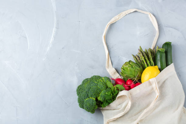 istock Mesh bag with fruits, vegetables. Zero waste, plastic free concept 1180010957