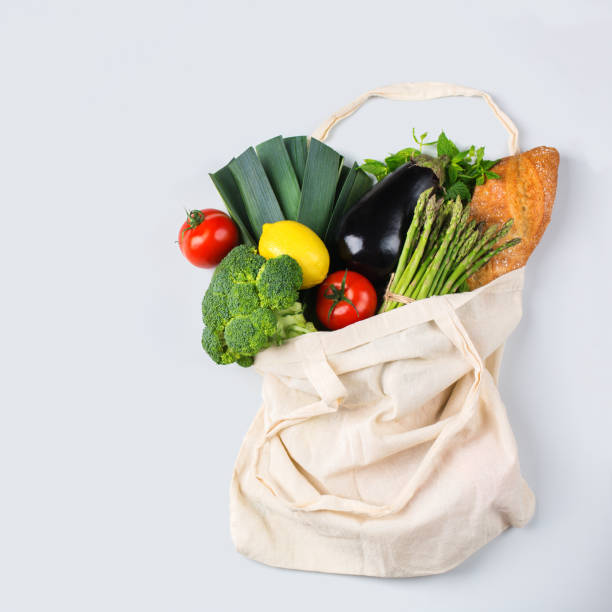 istock Mesh bag with fruits, vegetables. Zero waste, plastic free concept 1180010963