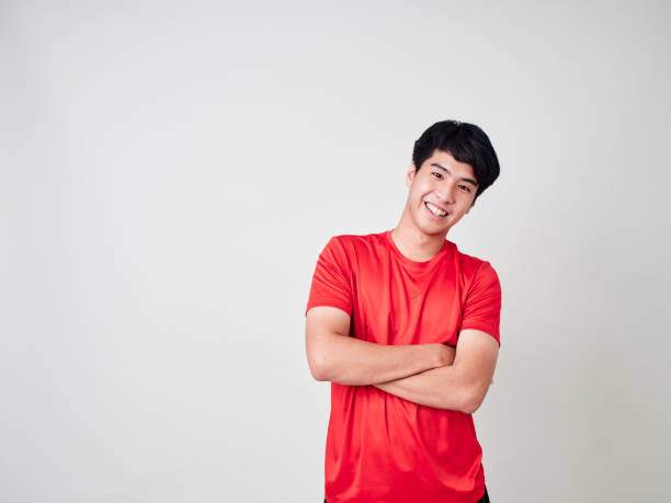 istock Young man stretching and exercising in sportswear on white background 1180011408
