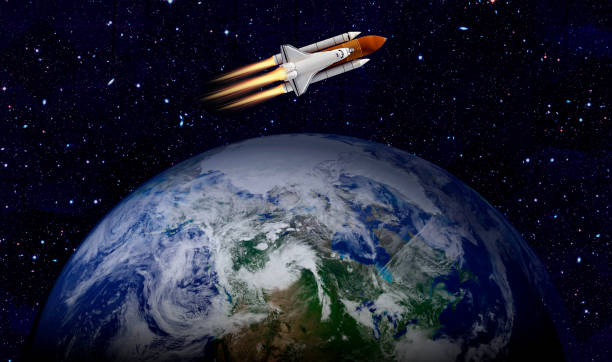 istock Space shuttle orbiting Earth planet. Elements of this image furnished by NASA 1180013052
