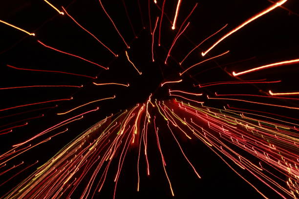 istock Glowing abstract Colorful light trail lines on dark background. 1180014319