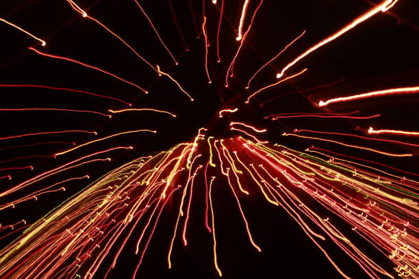 istock Glowing abstract Colorful light trail lines on dark background. 1180014348