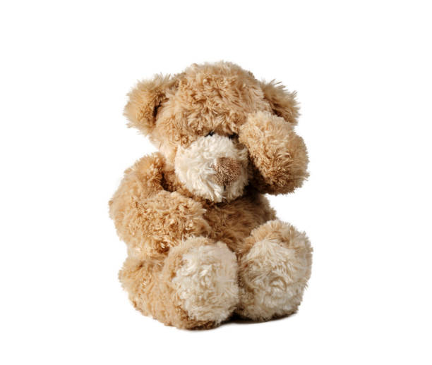 istock Cute bear toy isolated on white background 1180014406